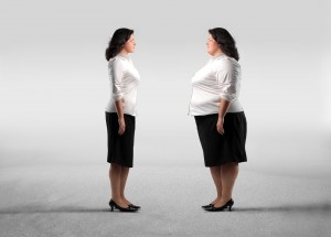 bigstock-Fat-woman-standing-in-front-of-12163673